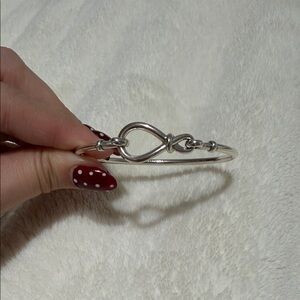 Pandora Silver Infinity Knot Bangle with Red Nail Accent